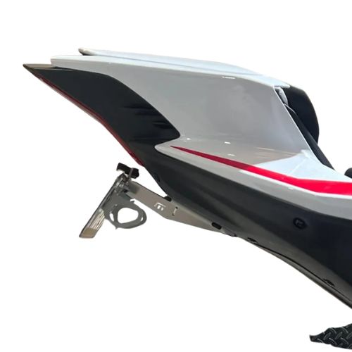 A close up of a yamaha r9 tail tidy in aluminium metal, mounted to the rear of the motorcycle, pictured at a 90 degree angle, 